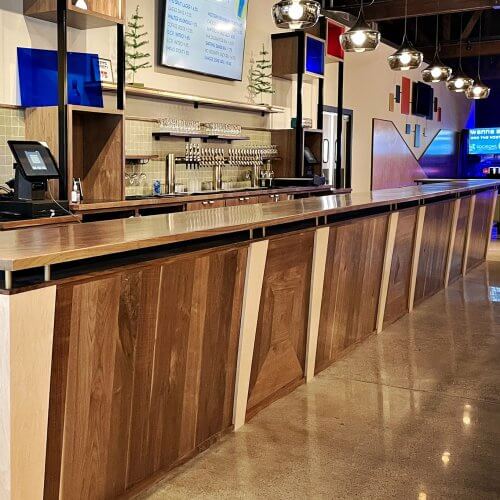 We're proud to feature a midcentury-inspired bar, perfect for enjoying craft beer or other food and drinks while waiting for an night of duckpin bowling!